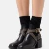MICHAEL Michael Kors Damen KEISHA SOCK BOOTIE - Plateaustiefelette - Black/brown -MICHAEL Michael Kors 16cb8fb3c24e40e8af21b2f29e4b9e09