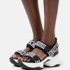 MICHAEL Michael Kors Damen OLYMPIA - Plateausandalette - Black/white -MICHAEL Michael Kors 5b8f090bd6db4b06b29ae918d8d0c141