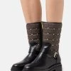 MICHAEL Michael Kors Damen LAYTON BOOTIE - Cowboy-/Bikerboot - Black/brown -MICHAEL Michael Kors babcbac754e34f549b6b210c05c32cea
