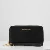 MICHAEL Michael Kors Damen JET FLAT CASE - Geldbörse - Black -MICHAEL Michael Kors cdf63f236ec345abae424836311029f1