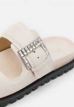 MICHAEL Michael Kors Damen GISELLE SLIDE - Pantolette Flach - Light Cream -MICHAEL Michael Kors f29d9d2669d34490beb50059d8791080